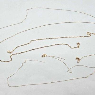 284 • 14k gold chains, 3.9g