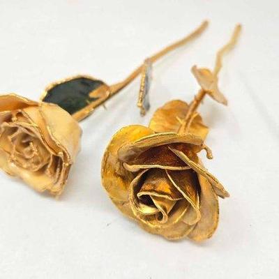 768 • (2) fake roses