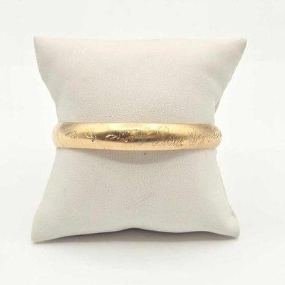 388 • 10k gold engraved bangle bracelet, 5.5g