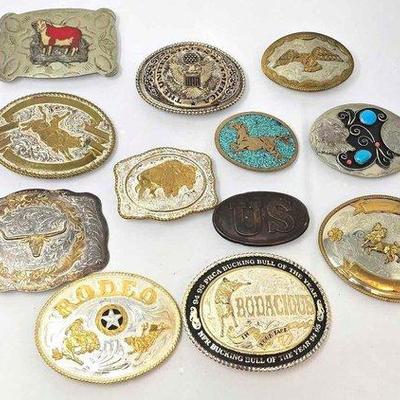 754 • (12) belt buckles