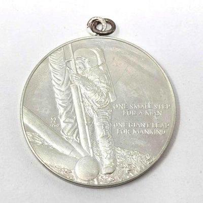 520 • sterling silver "first step on the moon" pendant