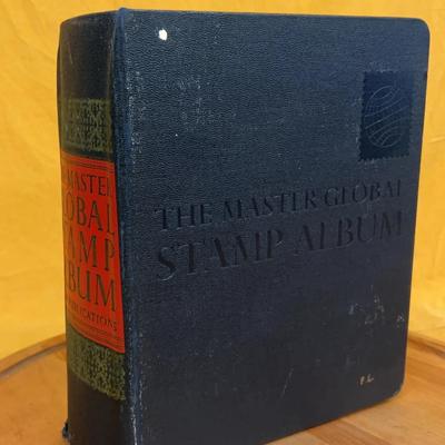 A used Master Global Stamp Album by ...US PUBLICATIONS