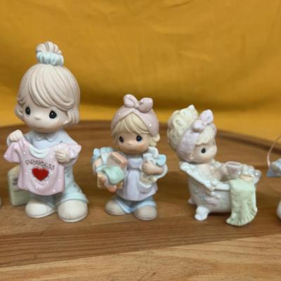 Collection of Enesco Precious Moments porcelain figurines, circa 2000