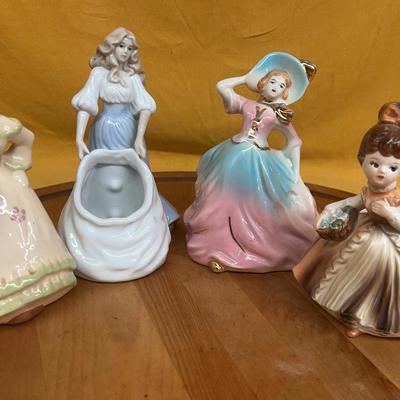 Collection of four vintage Japanese ceramic planter figurines