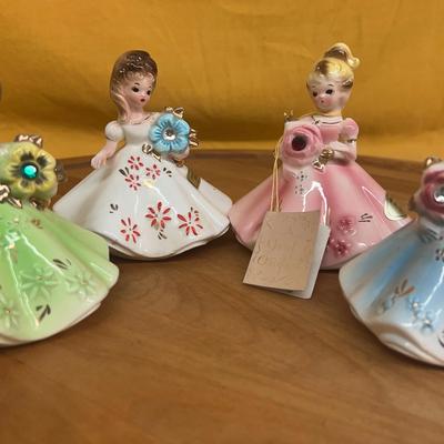 Set of four Josef Originals porcelain "Birthday Girl" figurines