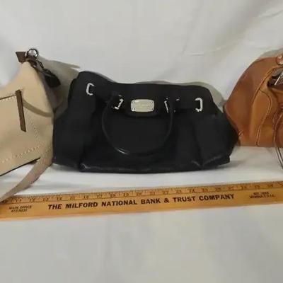 "It's Genuine" Leather Handbags 