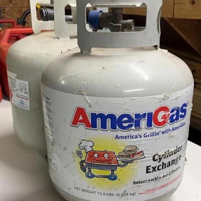 2- 20 lb propane Tanks, with filled with propane