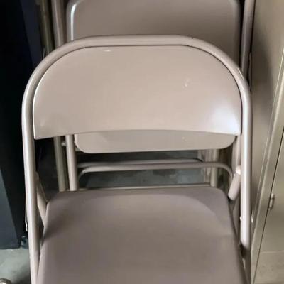 Six metal folding chairs,