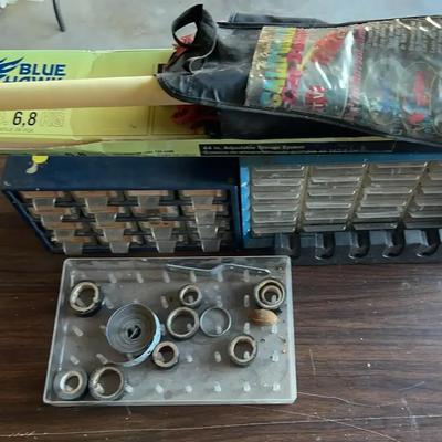 Two multi drawer storage cabinets and a tape organizer