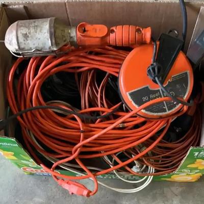 Box Of Extension Cords Featuring A 20 Foot Reel Light