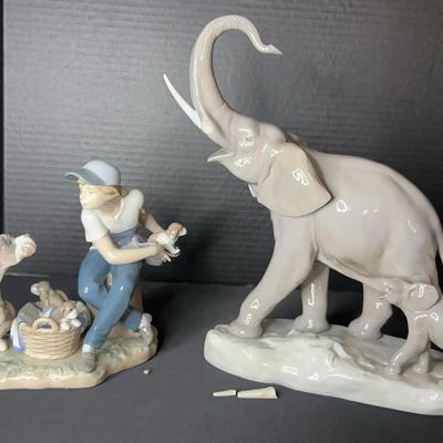 Lladro Figurines – #5376 “Boy With Dogs” & #1151 “Mother and Baby Elephant” (Damaged)