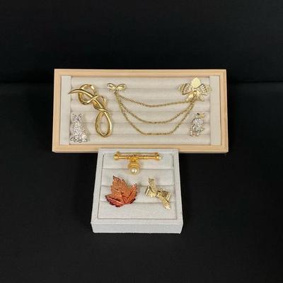 Faux Gold And Jeweled Brooches