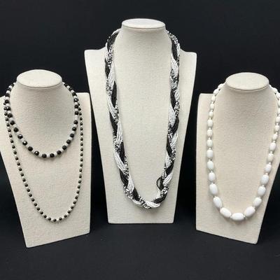 Various Black-And-White Beaded Necklaces
