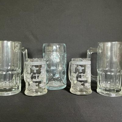 Various Sizes Of Collectible Beer Mugs
