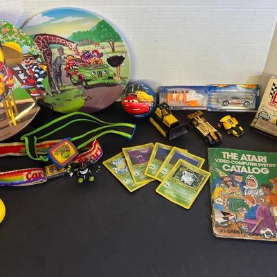 TMNT & Care Bears Belt, Buddy L Calculator, Atari Catalog, Pokemon Cards