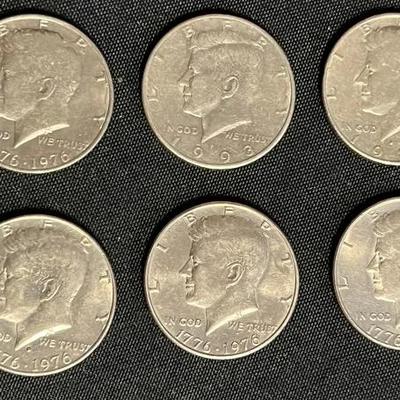 10 Kennedy Half Dollars