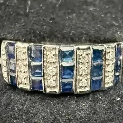 Close up of 14kt Blue Sapphire & Diamond Ring 