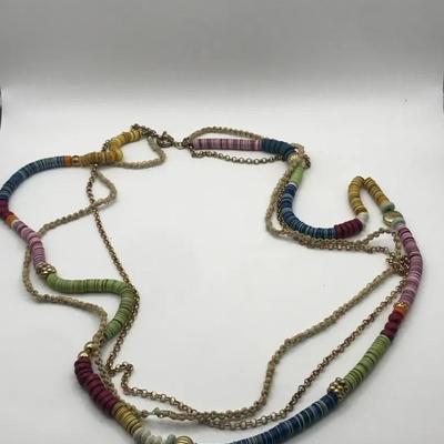 Multi-Strand Beaded Necklace With A Mix Of Colorful Tube Beads And Gold Tone Chains