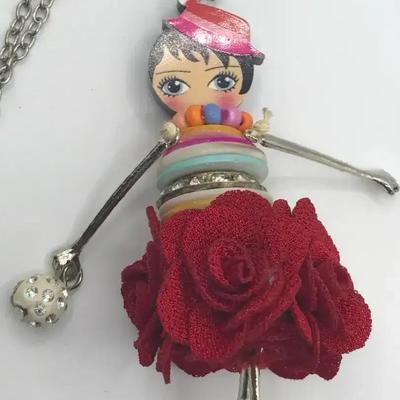 BONSNY Paris Doll Necklace with Red Floral Skirt and Multicolored Buttons 
