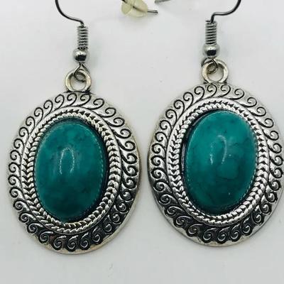 Silver Tone Earrings With a Dark Teal Stone