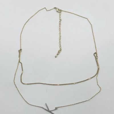 Gold Tone Necklace With A Sideways Letter K Pendant 16”