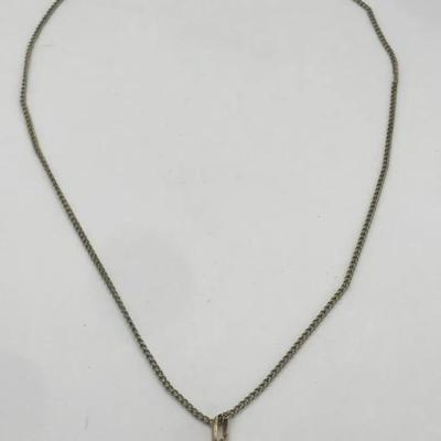 Silver Tone Necklace With A Caged Pendant 18”