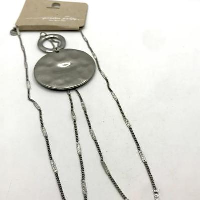 Silver Tone Long Chain Necklace With A Hammered Disc Pendant