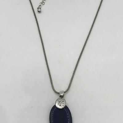 Silver Tone Pendant Necklace With A Dark Blue Oval Stone With Letters 'KC' 16”