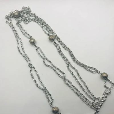 Multi Strand Necklace With Textured Beads 48”