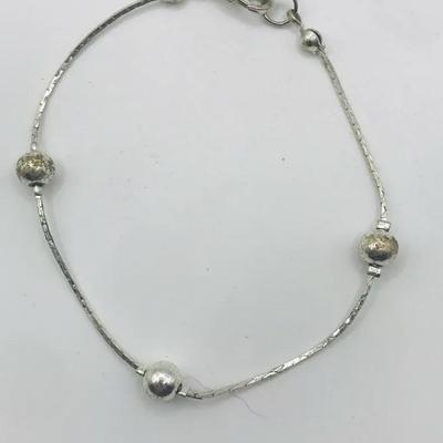 Cobra-Style Bracelet With Four Graduated Silver Balls 7”