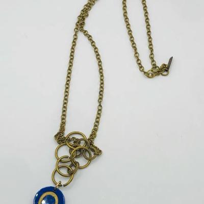 Gold Tone Chain Necklace With A Blue And Gold Horseshoe Pendant 24”