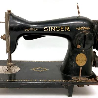 “Singer” 221 