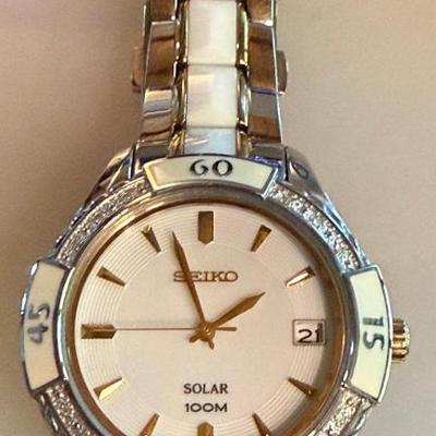Seiko SNE880 Classic Solar 100M Watch Steel & White Ceramic Face