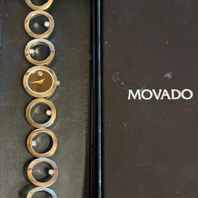 Swiss Movado Ono Diamond Quart Watch With Black Face & Silver Ring Tone Band In Original Box W Paperwork