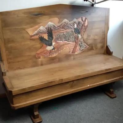 Large Bench Carved with Eagles in Flight 