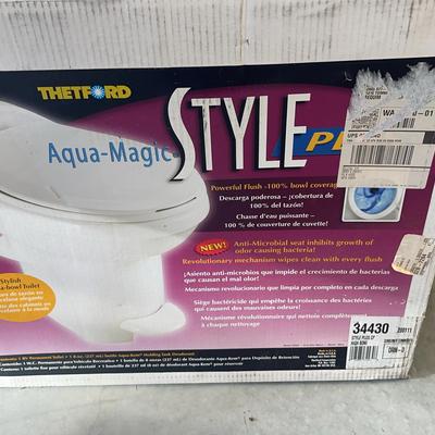 Thetford Aqua-Magic Style II permanent RV toilet. 
