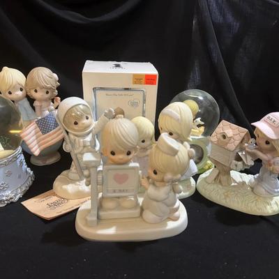 Several Fun Precious Moment’s 