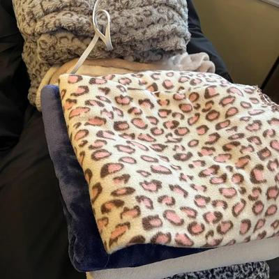 Six Cozy Throw Blankets Including One Heated Blanket