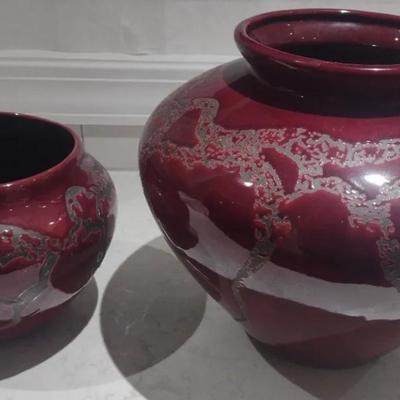 Two Deep Red Pottery Planters In Matching Pattern