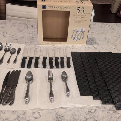 International 53 pc Silverware Set (Service For 8) & 4 Black Woven Placemats