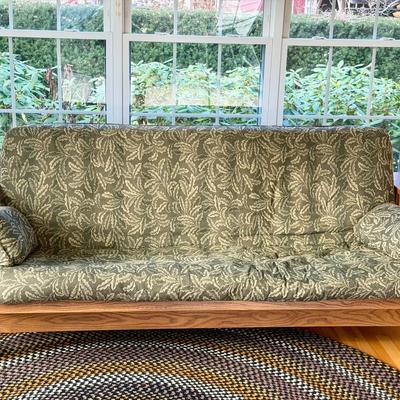 Futon With Leaf Print Cushion