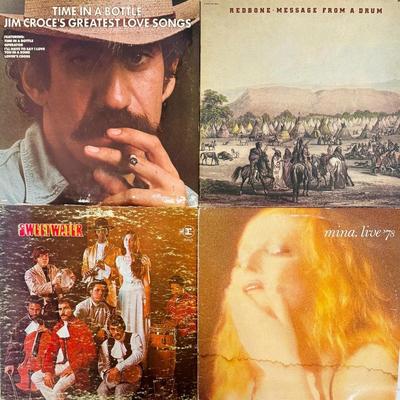 8 Vinyl 12” Records + Poster! 