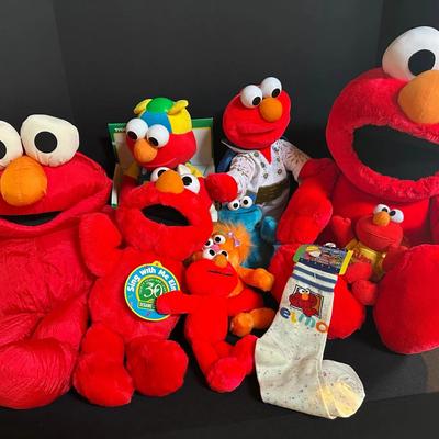 Vintage & Modern Elmo Plush Toys – Talking “Sing With Me Elmo,” Tyco Elmo, and more
