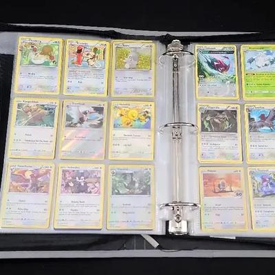 2008–2022 Pokémon Card Binder Featuring Charmander, Dragonite, Raichu & More