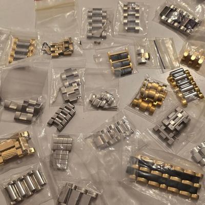 Spare Watchband Links (Presumably from Invicta, Tissot, and others)