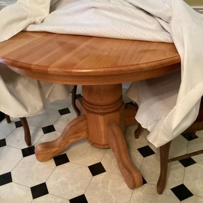 Sale Photo Thumbnail #216: Round wooden pedestal dining table img 3574