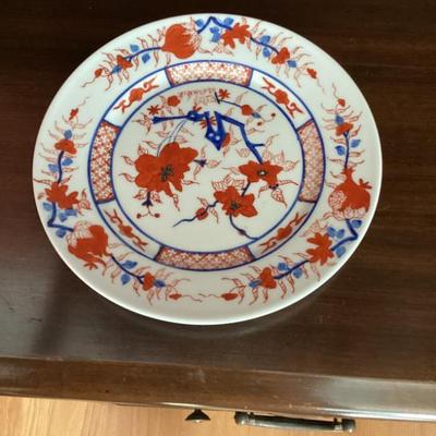 Sale Photo Thumbnail #239: Porcelain plate with red and blue floral design img 3543