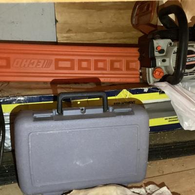 Sale Photo Thumbnail #37: Echo chainsaw with orange blade cover gray plastic tool case