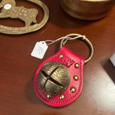 Sale Photo Thumbnail #593: $15 brass and leather. 