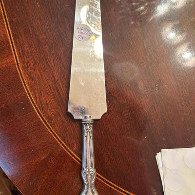 Sale Photo Thumbnail #253: Sterling silver handle. $24. 